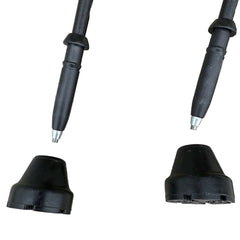 Two black rubber boots with metal tips on a white background